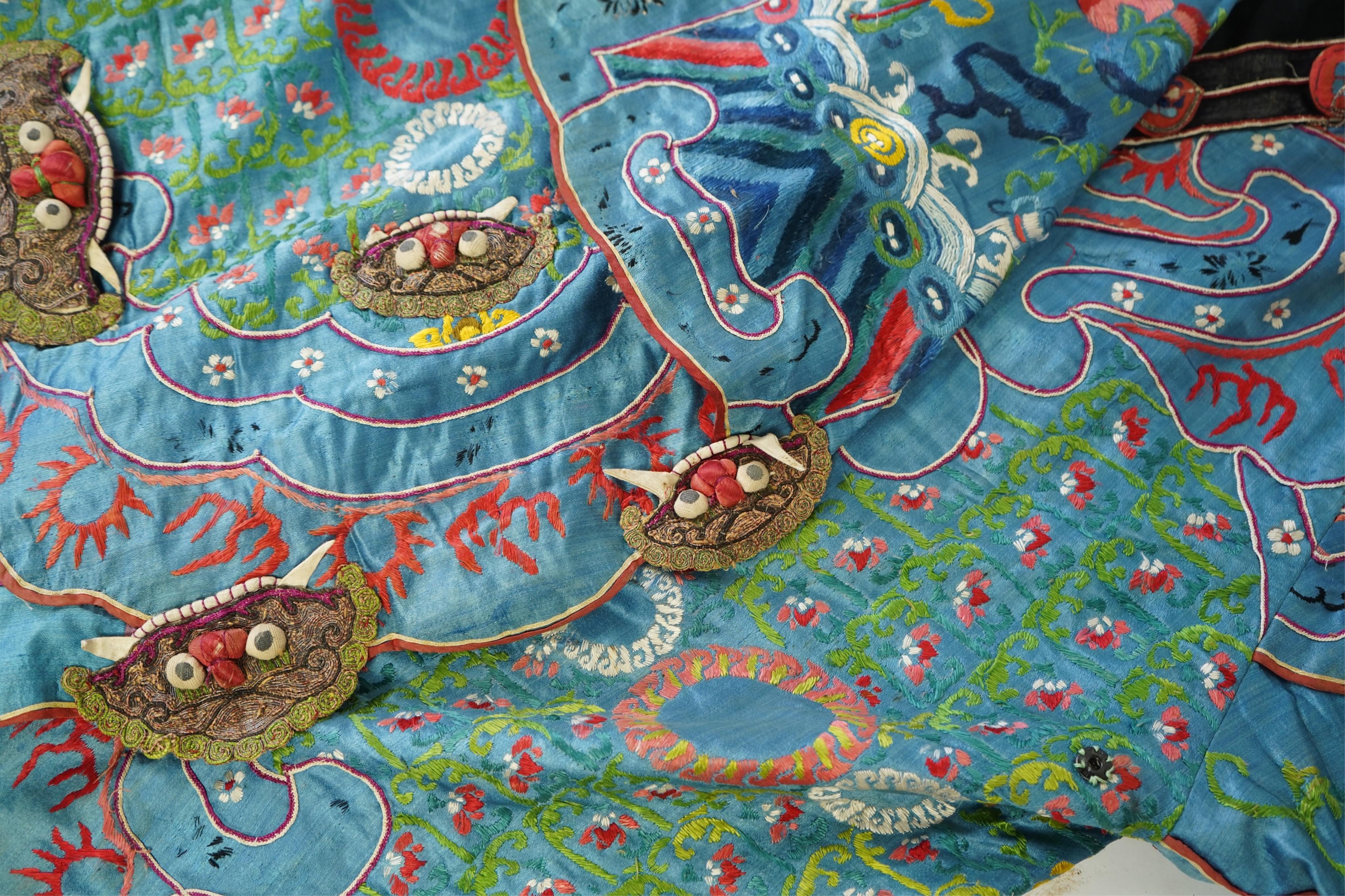 An unusual late 19th early 20th century Chinese silk embroidered robe, made for the tiger role, Jing, who symbolises power, bravery, protection and royalty. A character often used in Chinese opera, theatre and performing